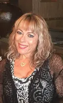 Mrs. Melanie Stavropoulos